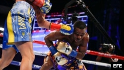 Lomachenko y Rigondeaux en la pelea.